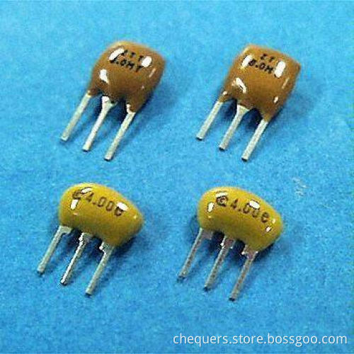 MHz-Band Ceramic Resonators with Built-In Load Capacitors